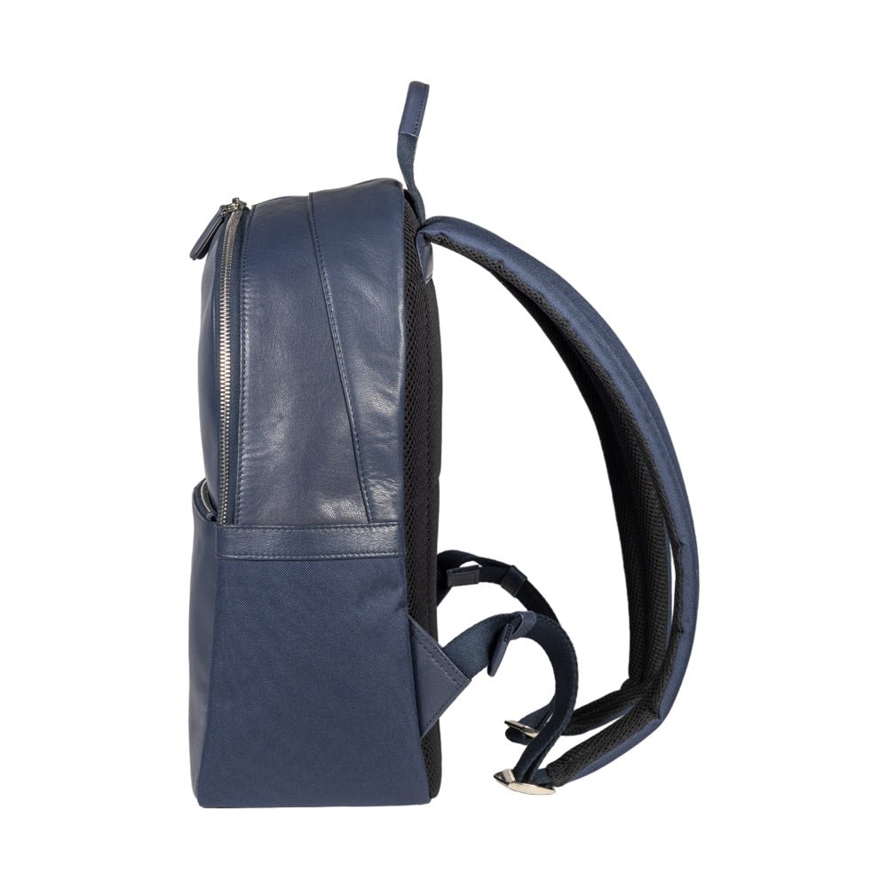 RB2001D | Zaino Porta Netbook/Tablet en Nylon/Vera Pelle, avec leggera grana. Chiusura con lampo e spallacci regolabili - Colore Blu - Dimensions: cm 27 x 38 x 14. Confezione: Sacchetto Tessuto non Tessuto