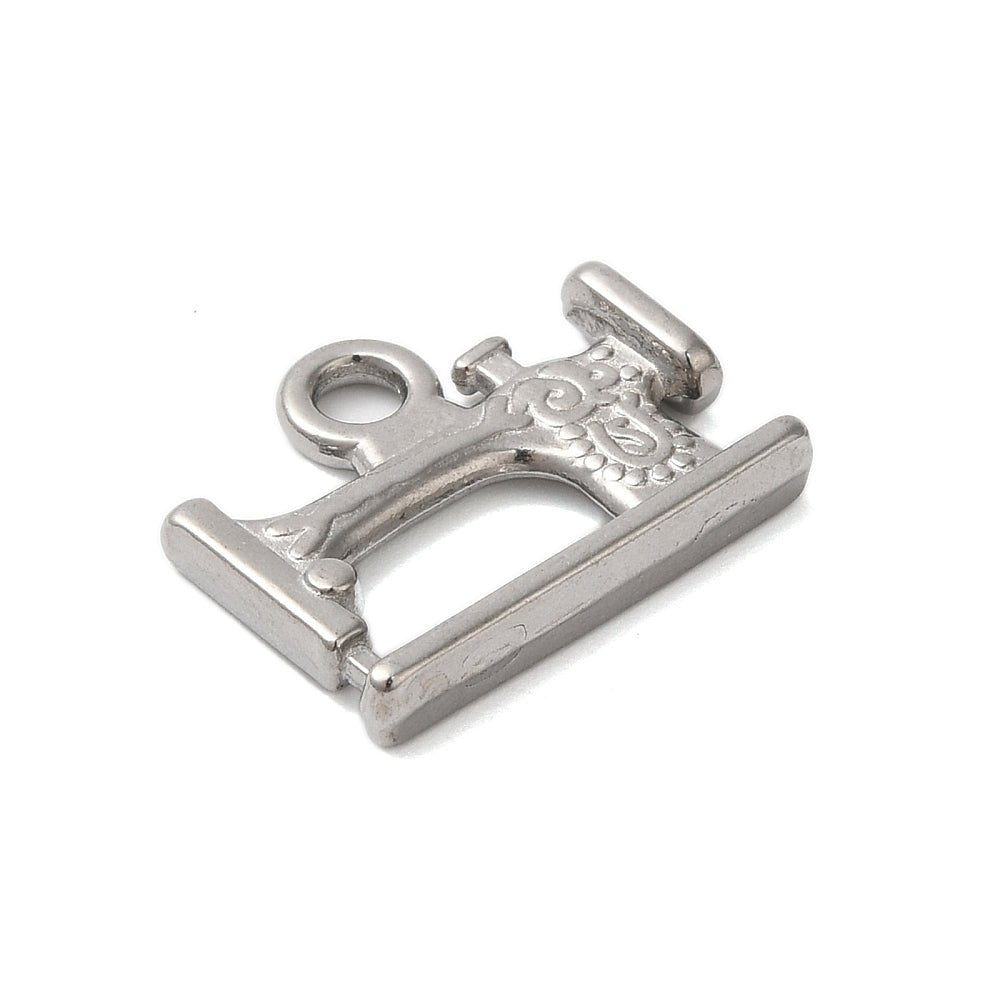 Silver sewing machine charm