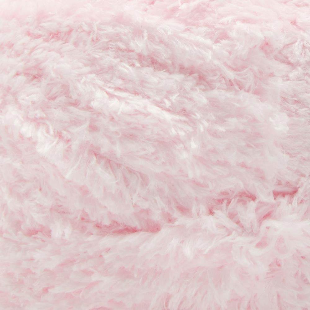 Soft pink yarn showing crochet and knitting supplies Canada for various crafting projects