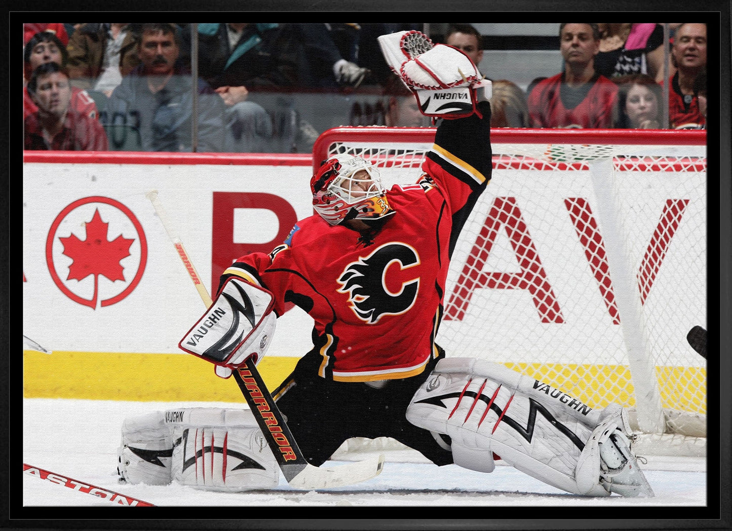 Miikka Kiprusoff 20x29 Framed Canvas Flames Glove Save-H - www.Shopthatapp.com
