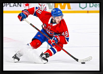 Lane Hutson 20x29 Framed Canvas Montreal Canadiens - www.Shopthatapp.com