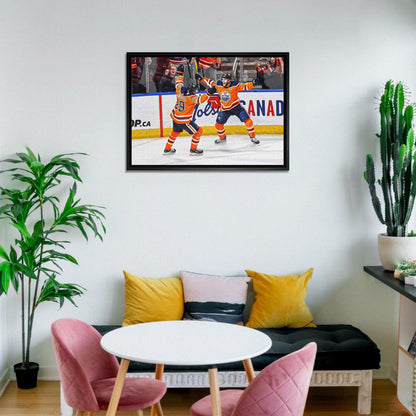 Leon Draisaitl and Connor McDavid 20x29 Framed Canvas Oilers Celebration-H - www.Shopthatapp.com