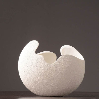 Simple white ceramic vase decoration - www.Shopthatapp.com