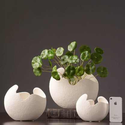 Simple white ceramic vase decoration - www.Shopthatapp.com