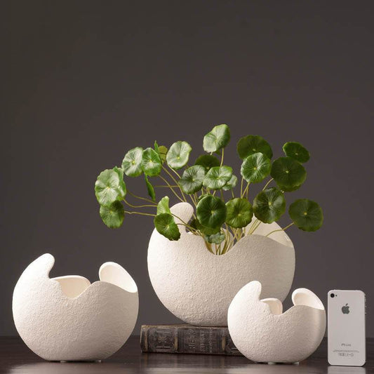 Simple white ceramic vase decoration - www.Shopthatapp.com