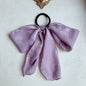 Silk satin oversized bow tie Hair Scrunchies ponytail Holder - www.Shopthatapp.com