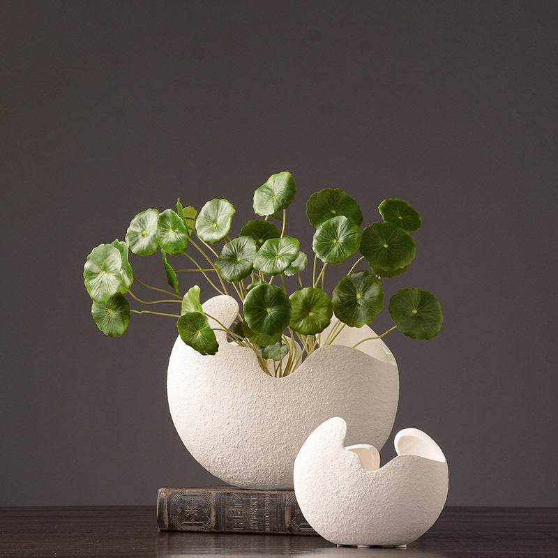 Simple white ceramic vase decoration - www.Shopthatapp.com
