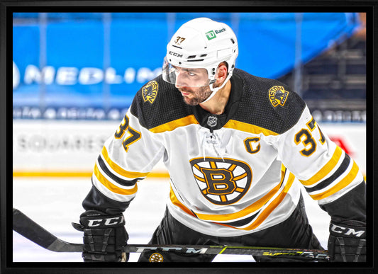Patrice Bergeron Boston Bruins Framed 20x29 Face-Off Canvas - www.Shopthatapp.com