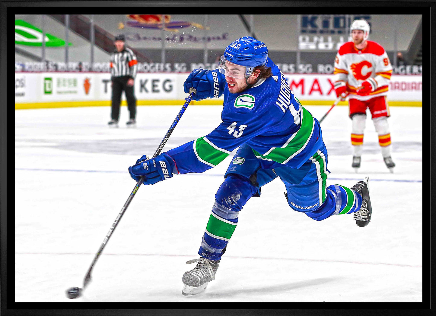 Quinn Hughes Vancouver Canucks Framed 20x29 Shooting Canvas - www.Shopthatapp.com