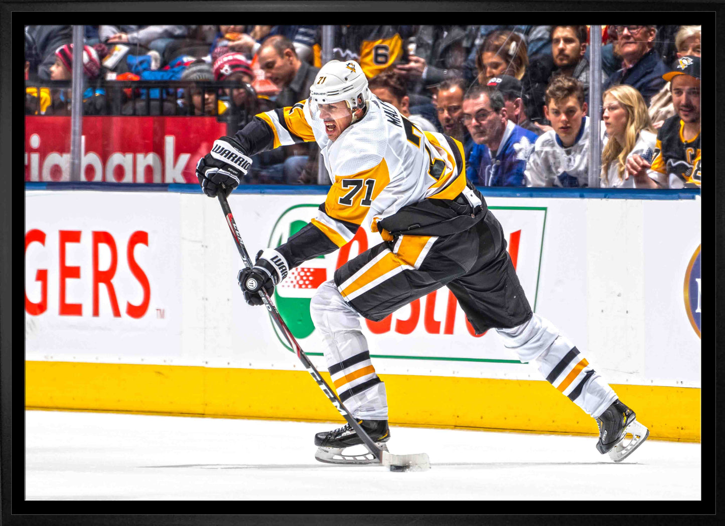 Evgeni Malkin Pittsburgh Penguins Framed 20x29 Passing Puck Canvas - www.Shopthatapp.com