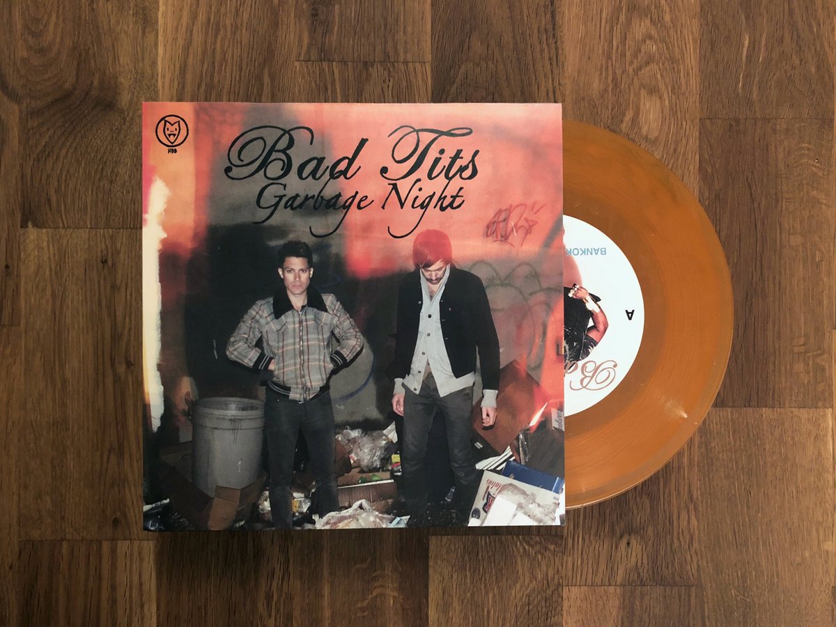 Bad Tits / Garbage Night (EP) - Translucent Orange 7" Vinyl - www.Shopthatapp.com