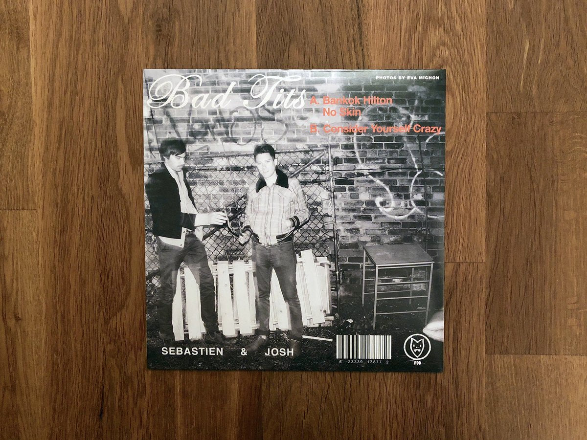 Bad Tits / Garbage Night (EP) - Translucent Orange 7" Vinyl - www.Shopthatapp.com