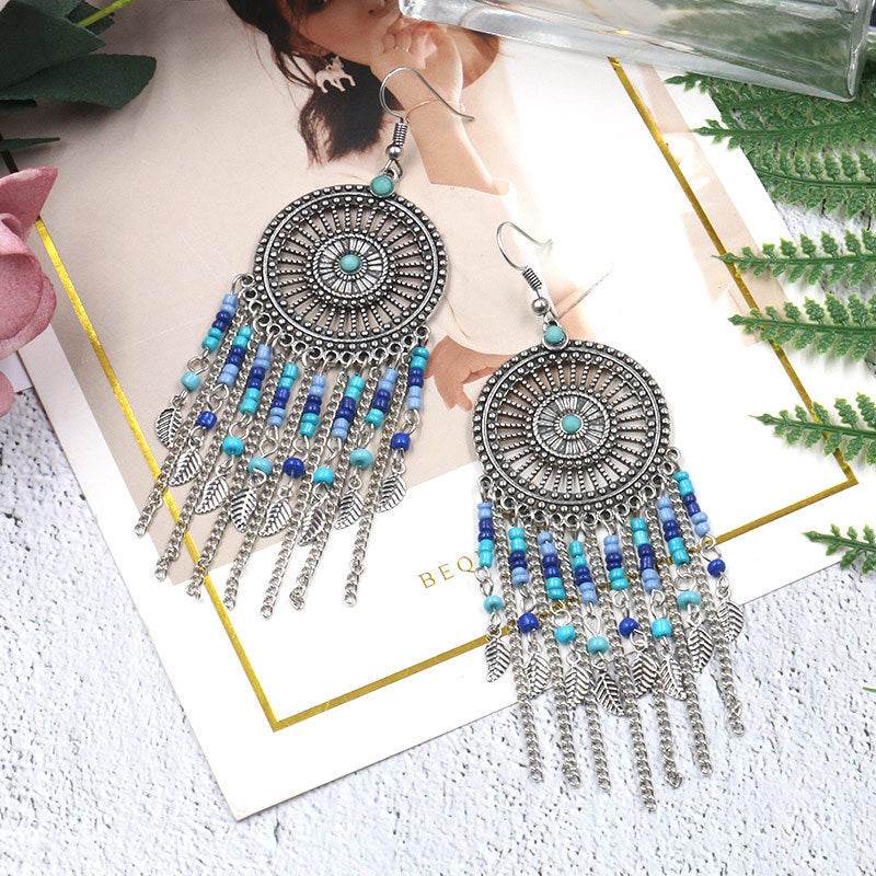 Beaded fringed hollow earrings - www.Shopthatapp.com