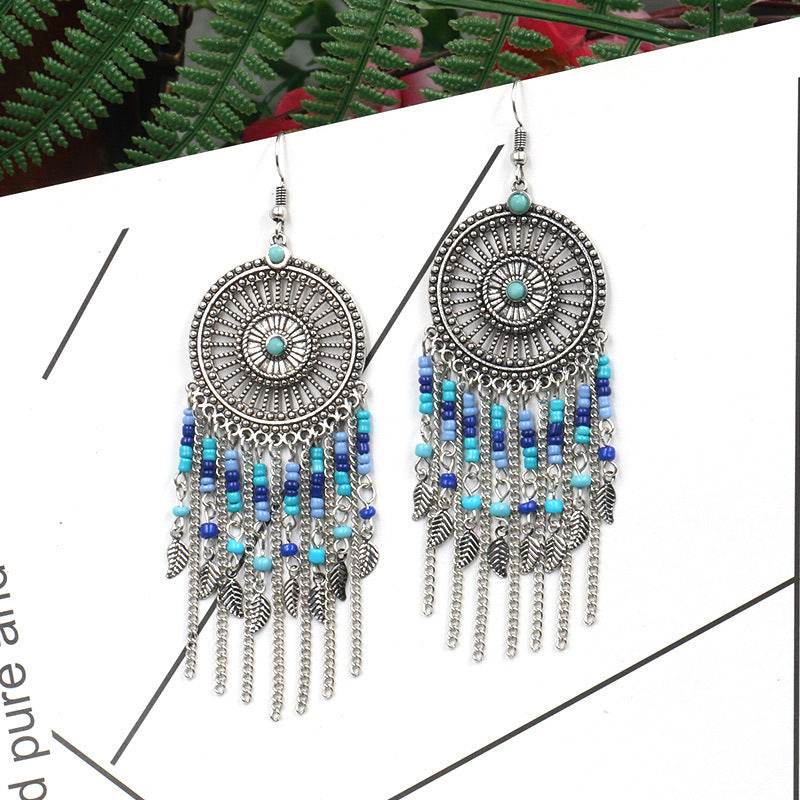Beaded fringed hollow earrings - www.Shopthatapp.com