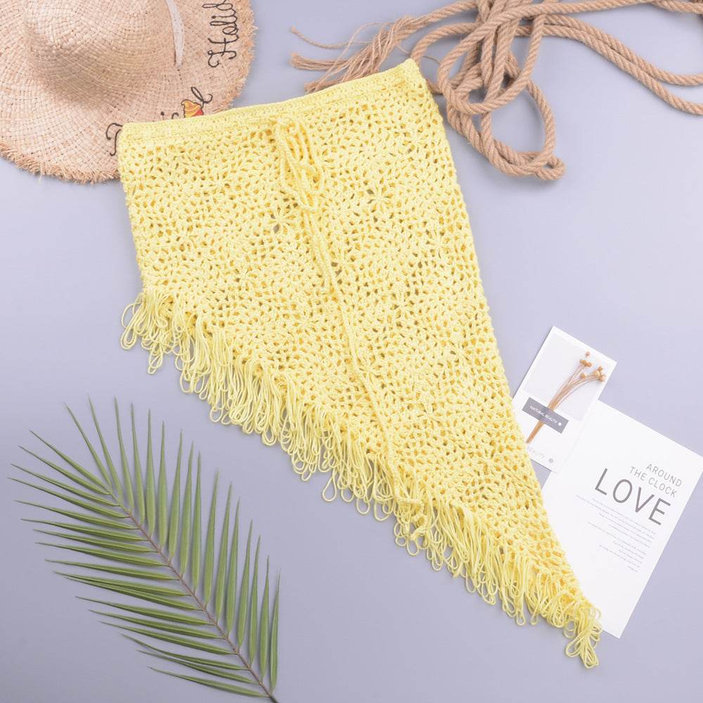 European And American Women's See Through Hollow Knitted tassel fringe Slant Beach Skirt - www.Shopthatapp.com