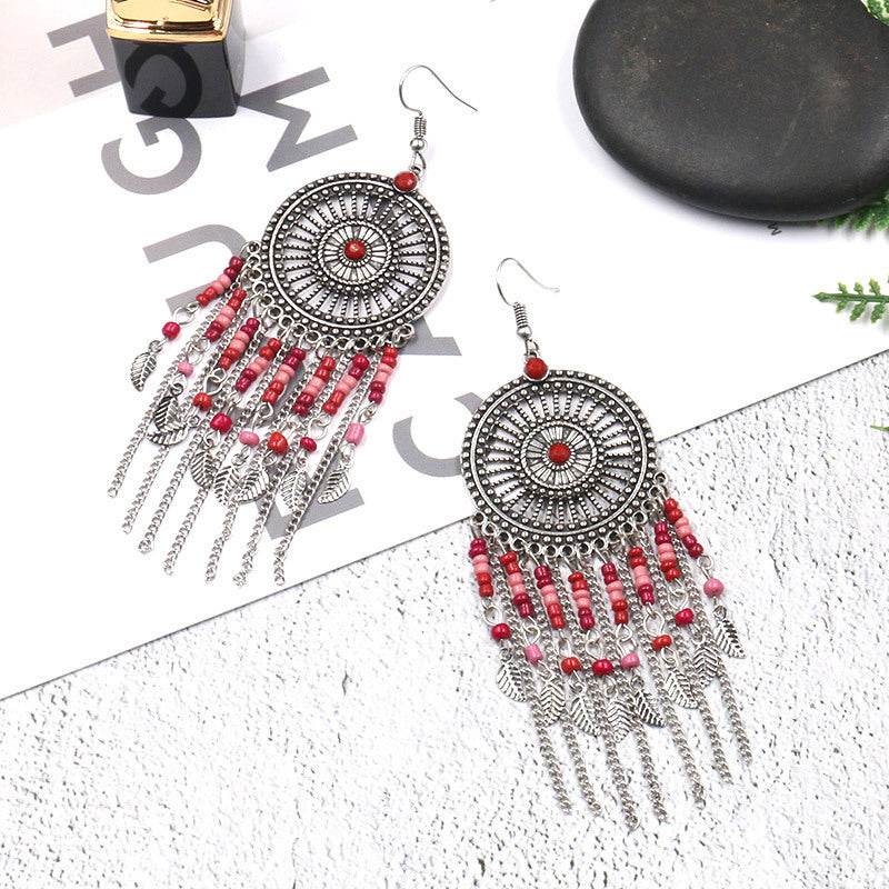 Beaded fringed hollow earrings - www.Shopthatapp.com
