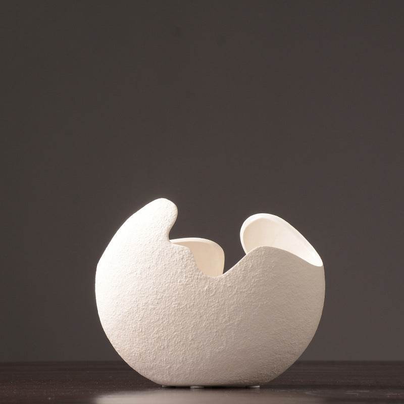 Simple white ceramic vase decoration - www.Shopthatapp.com