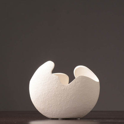 Simple white ceramic vase decoration - www.Shopthatapp.com