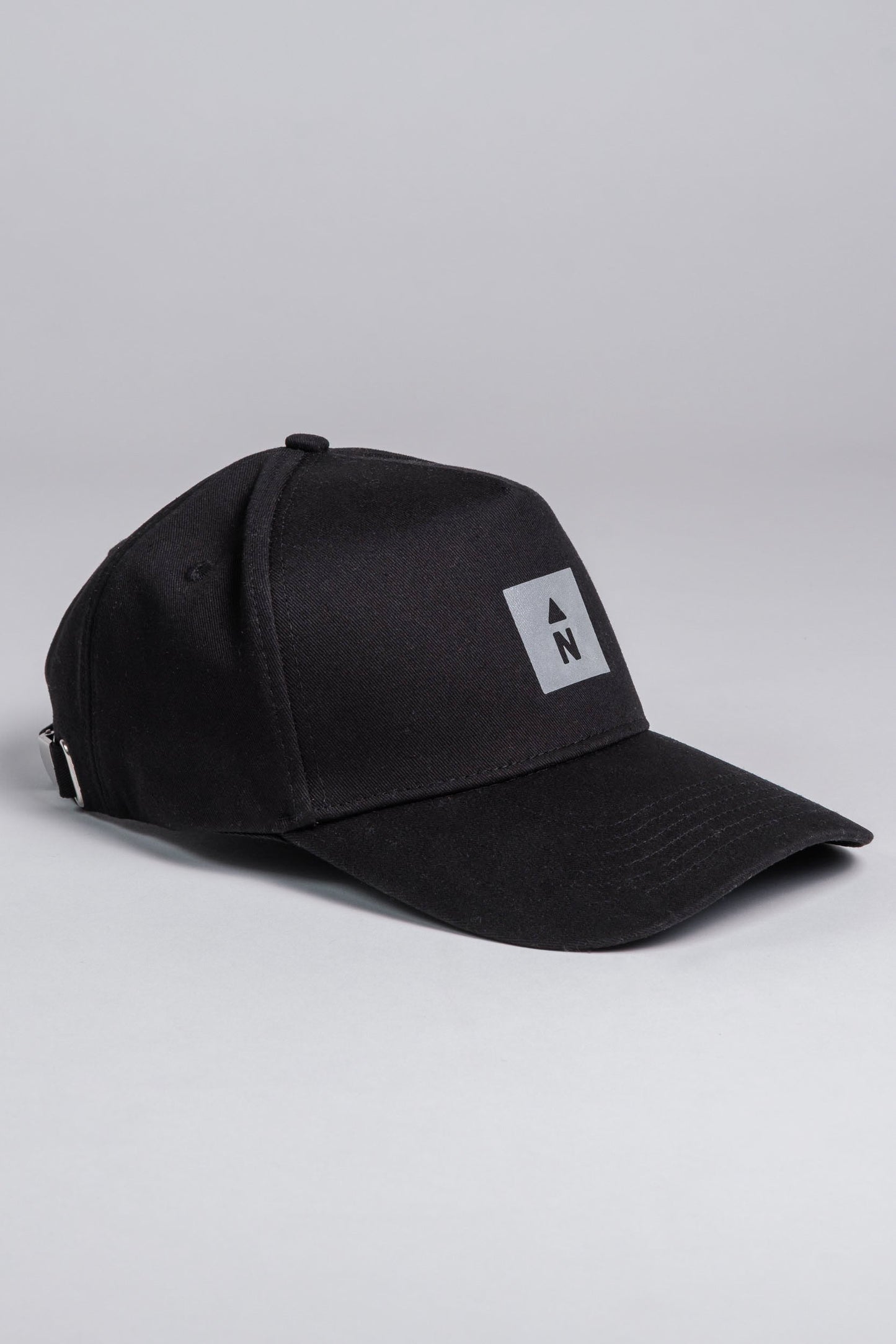 Water-Resistant Cap with Reflective "N" - www.Shopthatapp.com