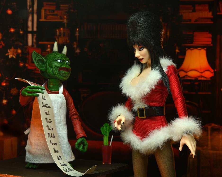 Neca - Elvira, Mistress of the Dark Elvira - Very Scary X-Mas Ver.) Deluxe Clothed - www.Shopthatapp.com #