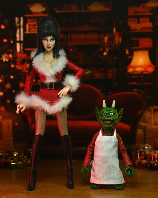 Neca - Elvira, Mistress of the Dark Elvira - Very Scary X-Mas Ver.) Deluxe Clothed - www.Shopthatapp.com #