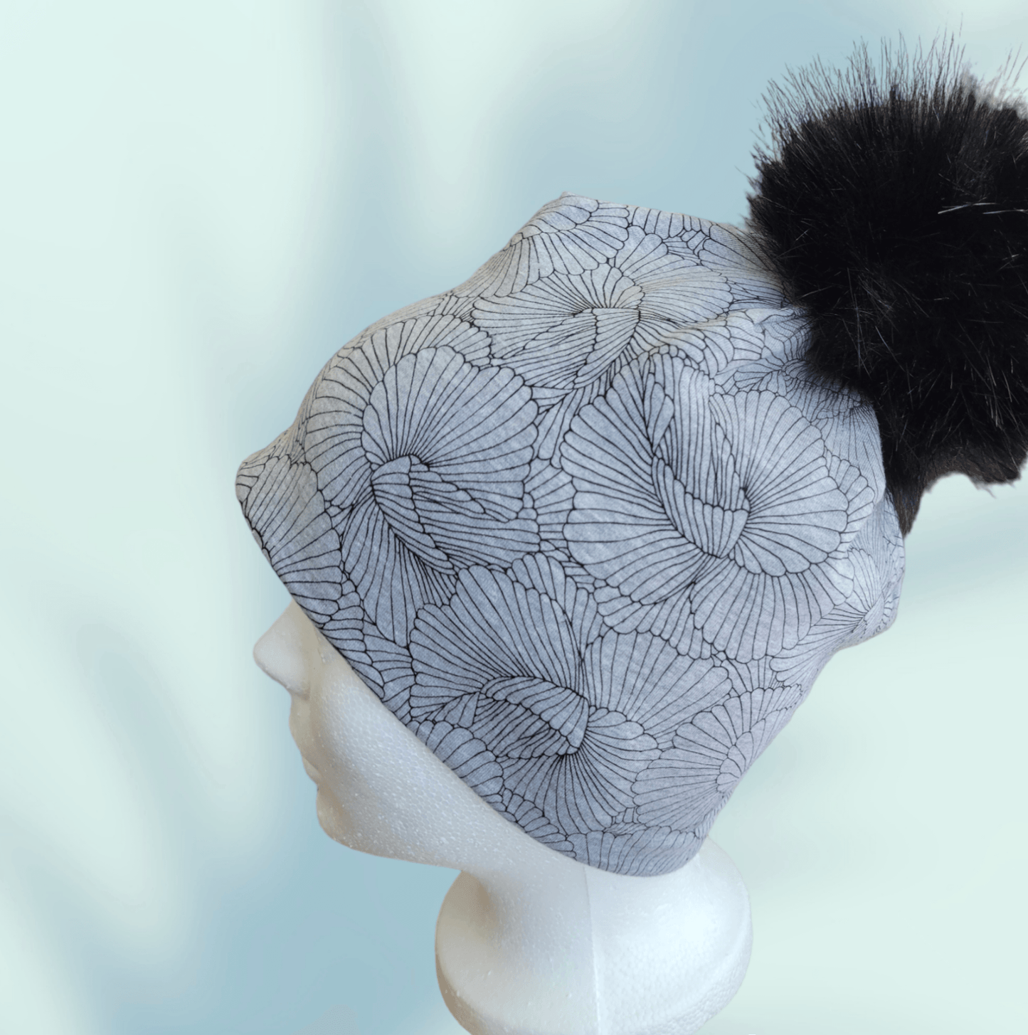 Tuques (doublées micropolaires) à pompons détachables