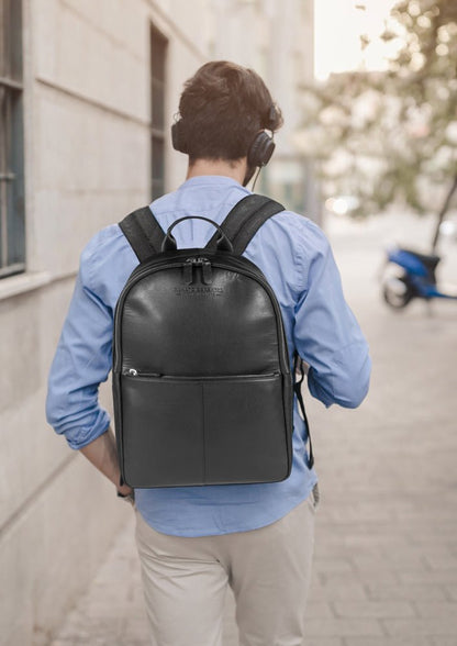 RB2001A | Zaino Porta Netbook/Tablet en Nylon/Vera Pelle, avec leggera grana. Chiusura con lampo e spallacci regolabili - Colore Nero - Dimensions: cm 27 x 38 x 14. Confezione: Sacchetto Tessuto non Tessuto