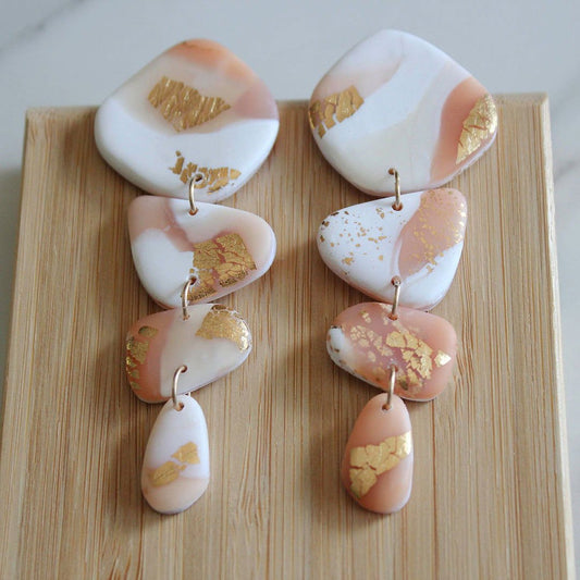 Alma Rosa Bold Gold Leaf Earrings for Elegant Style - www.Shopthatapp.com