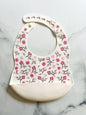 Bavette en silicone avec motifs fleurs - www.Shopthatapp.com