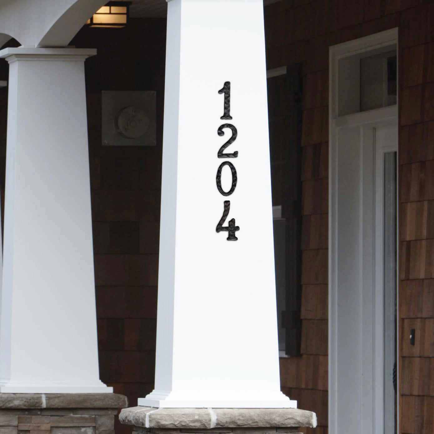 Black cast iron letter C for elegant home decor, perfect for custom signage or personalization