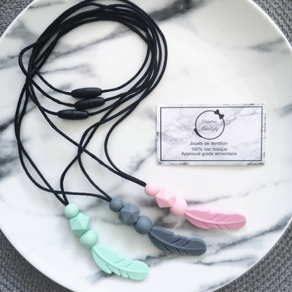collier d'allaitement plume - www.Shopthatapp.com