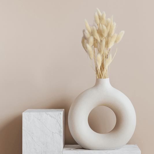 Cream Bunny Tails - www.Shopthatapp.com