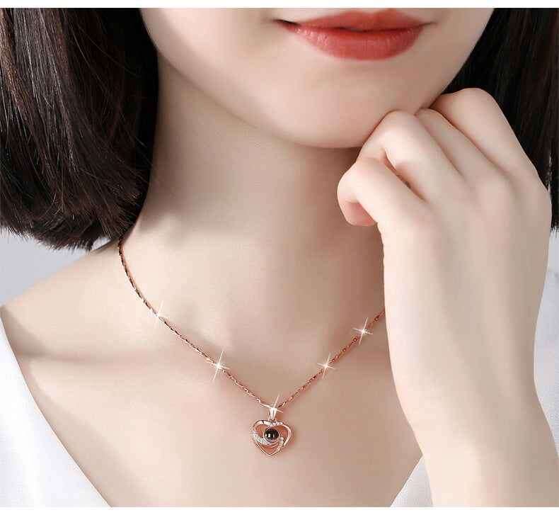 Custom pet necklace by PetWithMe featuring a heart pendant and sparkling design for pet lovers