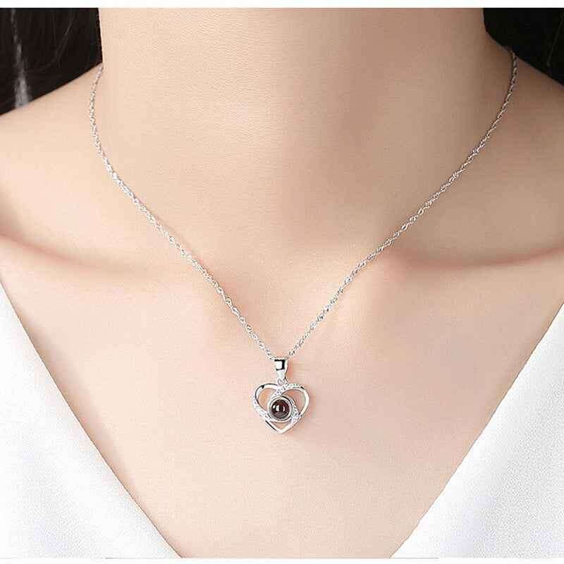 Elegant silver heart pendant on a chain featuring a custom pet necklace charm for pet lovers