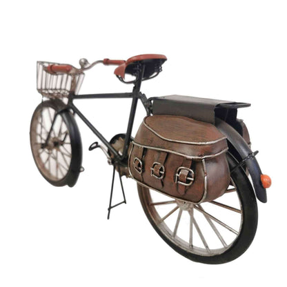 Decorative metal bicycle model with vintage styling and leather saddle bags for home decor