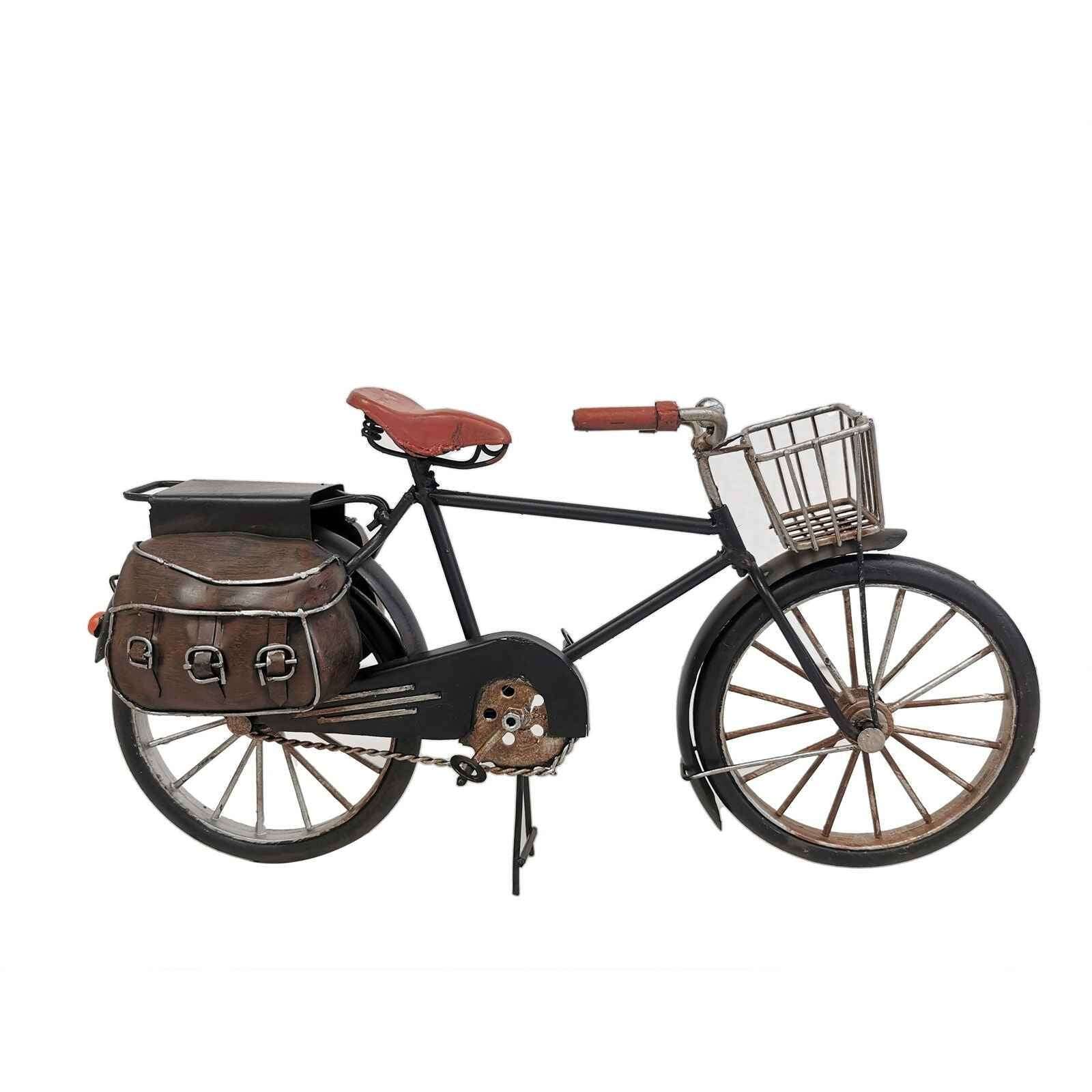 Rustic decorative metal bicycle model with vintage details and a leather saddle
