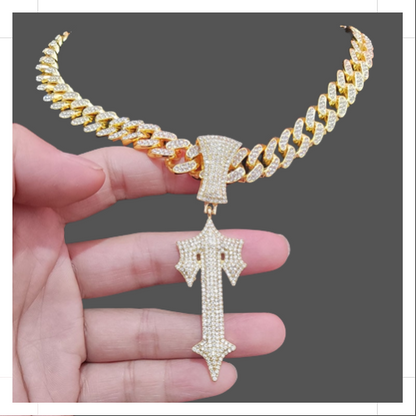 Elegant designer gold jewelry necklace with a unique pendant, crafted by Lost and Found Jewelers