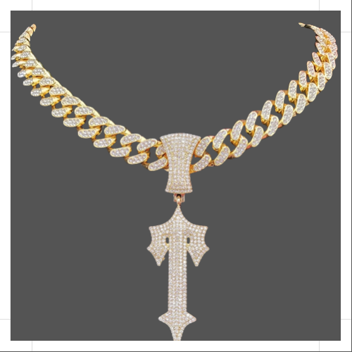Designer gold jewelry necklace featuring a sparkling pendant and intricate chain design
