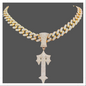 Designer gold jewelry necklace featuring a sparkling pendant and intricate chain design