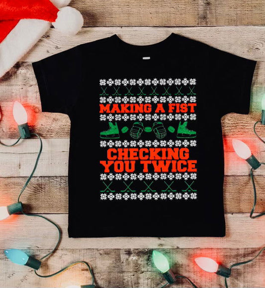 Festive hockey youth shirt featuring bright graphics and playful design for young sports fans
