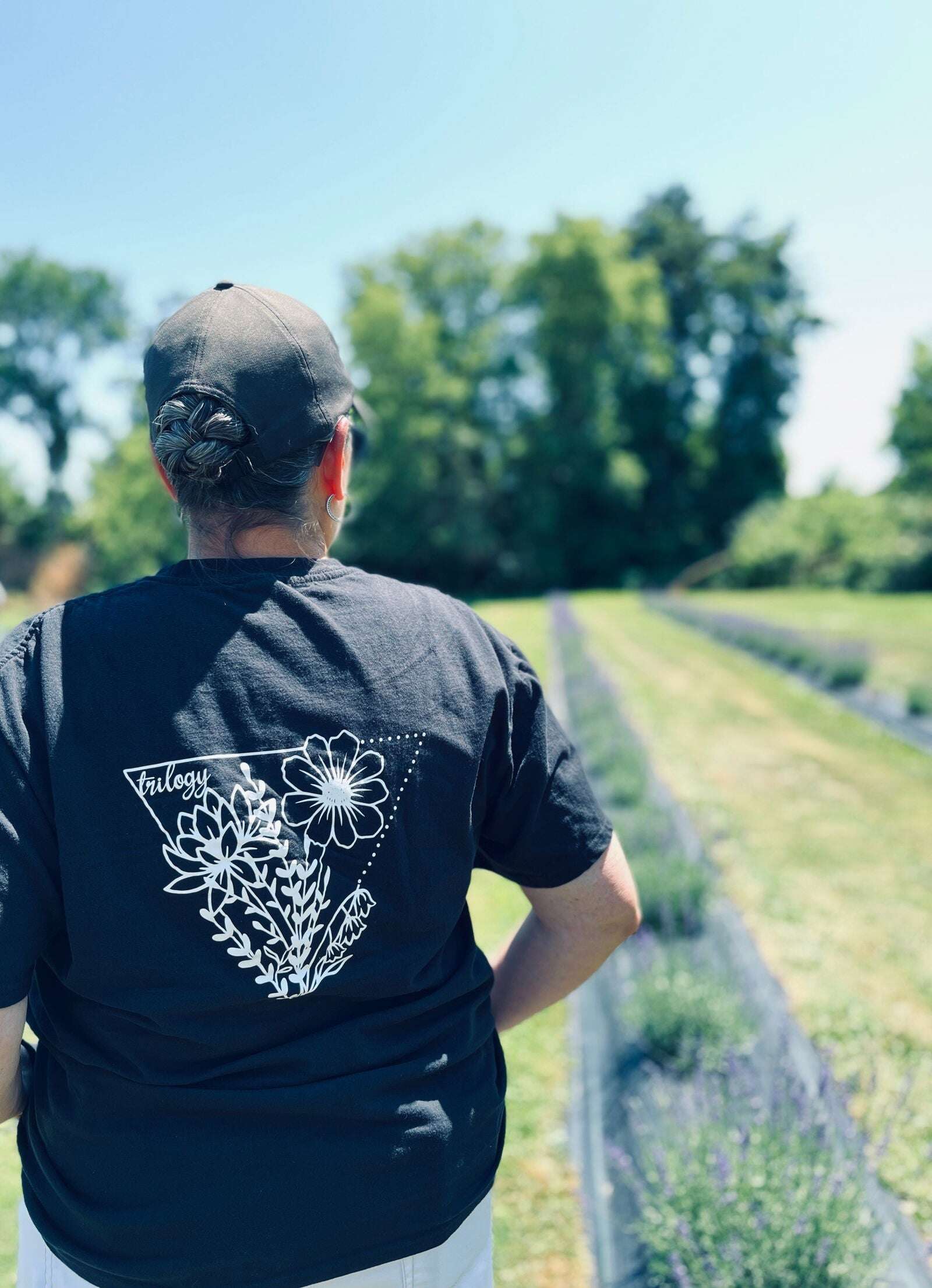 Women's floral t-shirt Canada featuring a stylish floral design on a black background