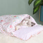 Cozy futon style pet bed for cats with a pink quilted design and soft polka dot pillow
