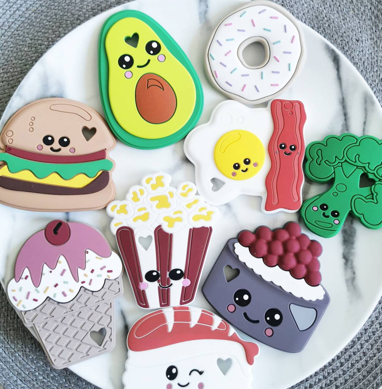 Colorful gourmet teething toys shaped like food items for babies and toddlers