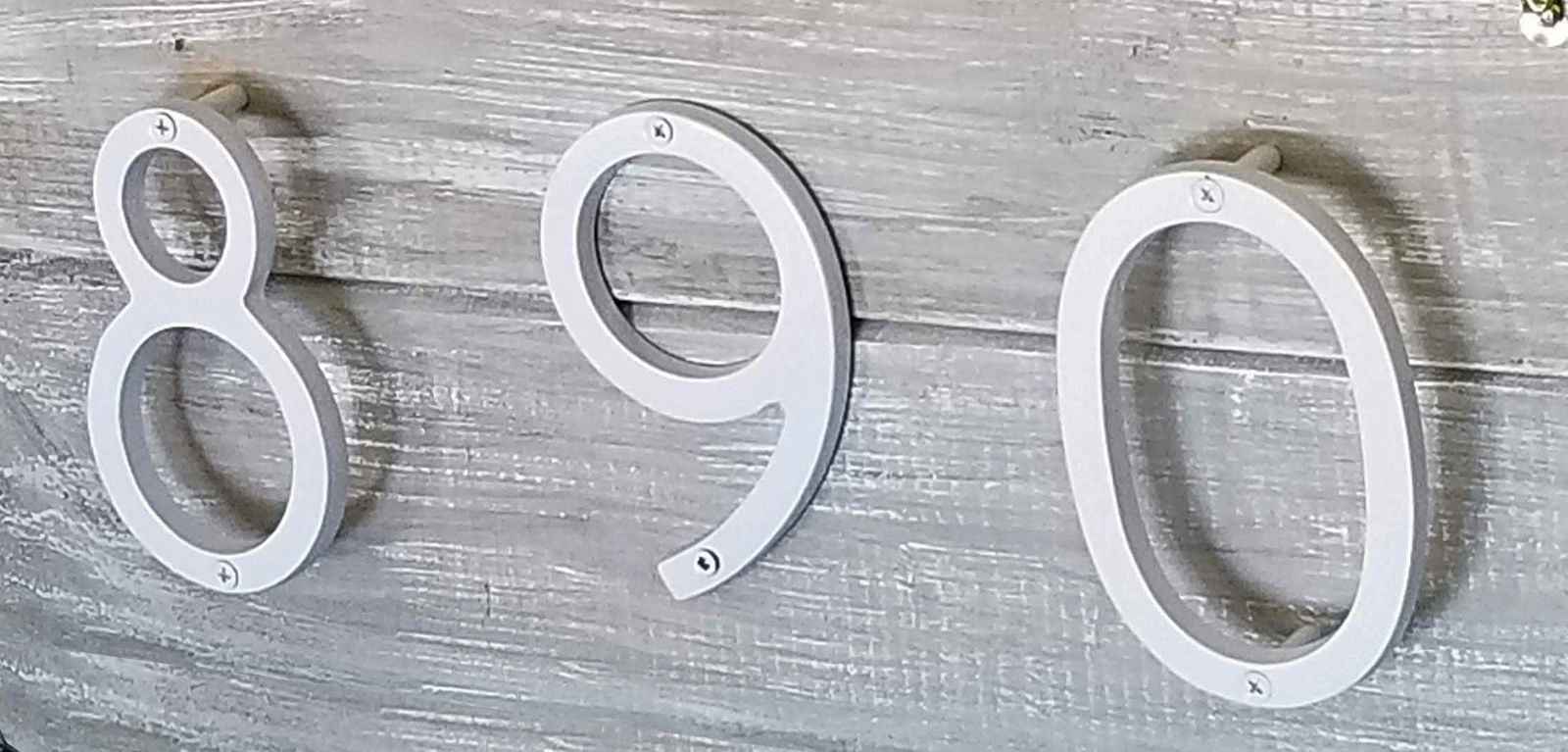 Modern house number 1 in white, perfect for stylish home decor enhancement
