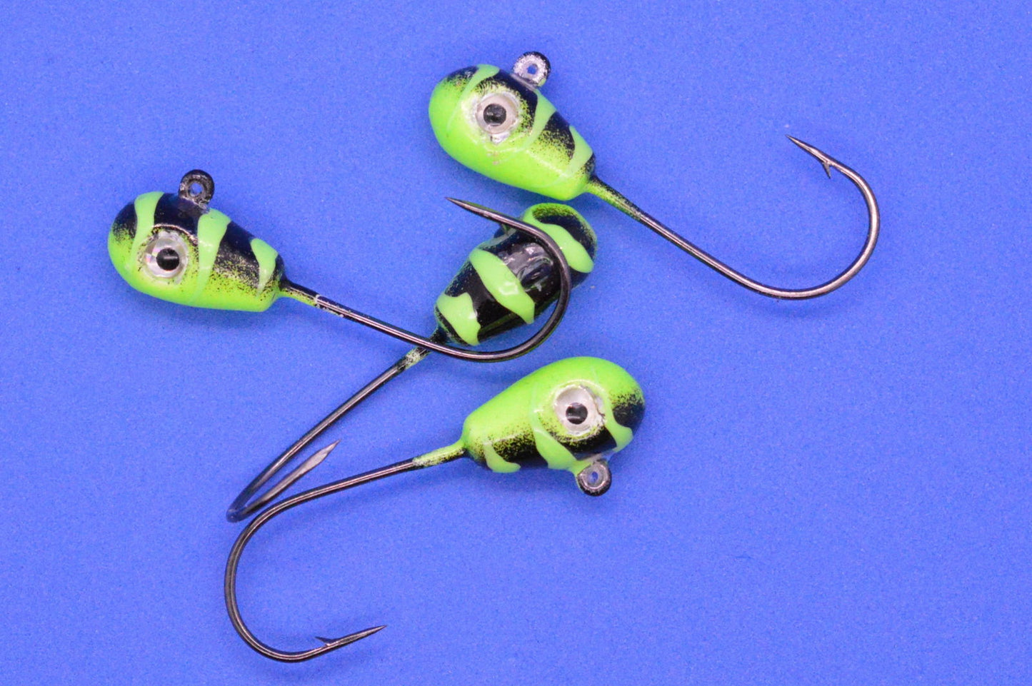 Big Sky Deluxe KnockOut 1/4oz Glow Jigs 4/pack - www.Shopthatapp.com