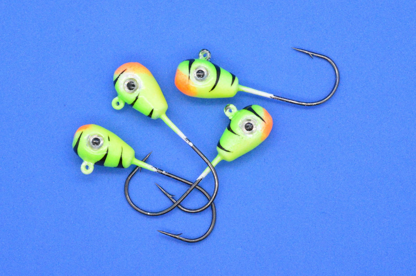 Big Sky Deluxe KnockOut 1/4oz Glow Jigs 4/pack - www.Shopthatapp.com