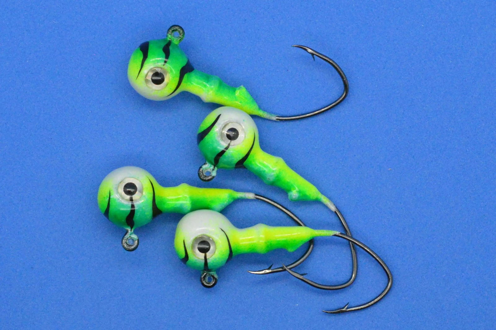 Big Sky Mean Machine 1/4oz Glow Jig Heads 4/pack - www.Shopthatapp.com