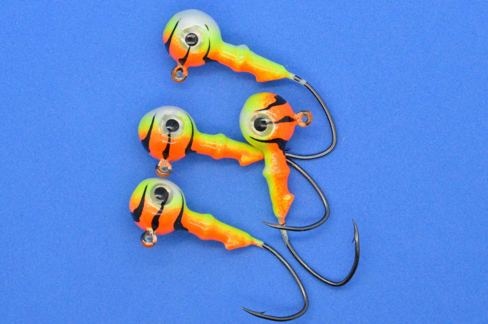 Big Sky Mean Machine 1/4oz Glow Jig Heads 4/pack - www.Shopthatapp.com
