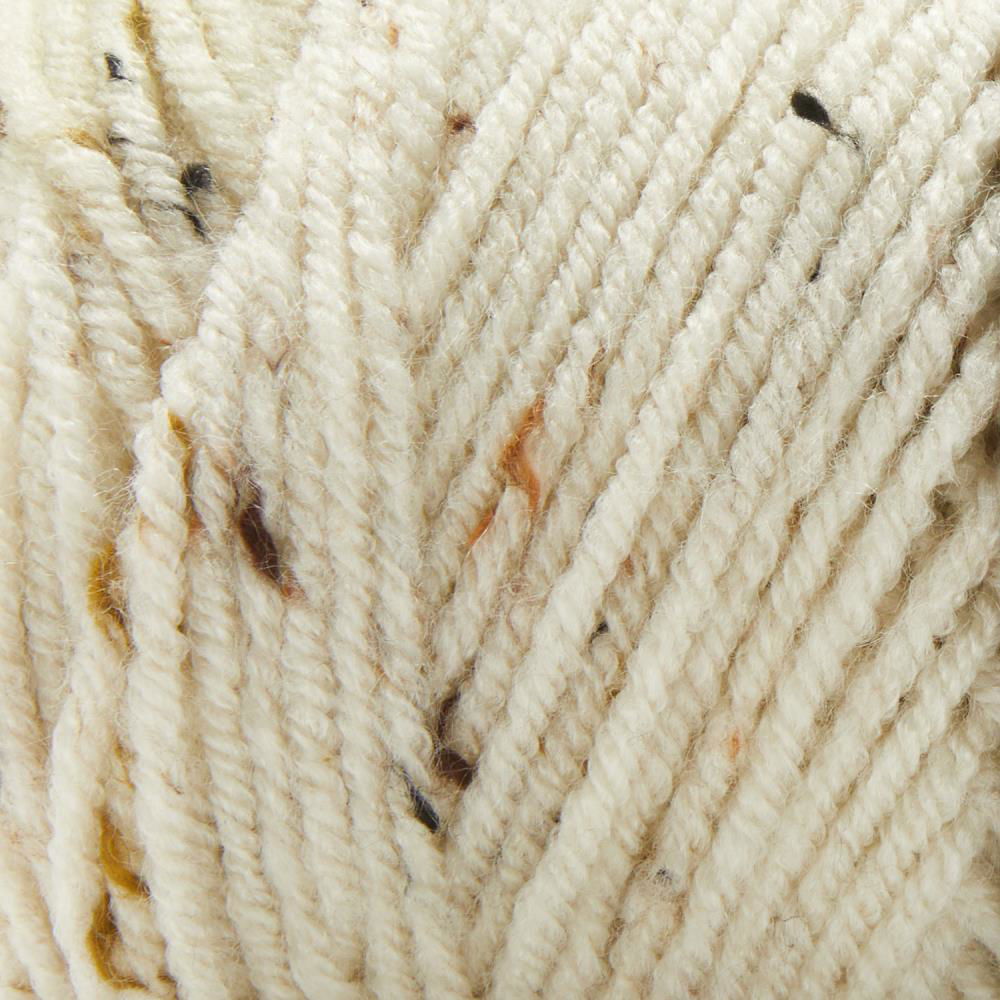Basix Tweed Yarn Canada in a soft cream color with colorful flecks for crocheting and knitting projects