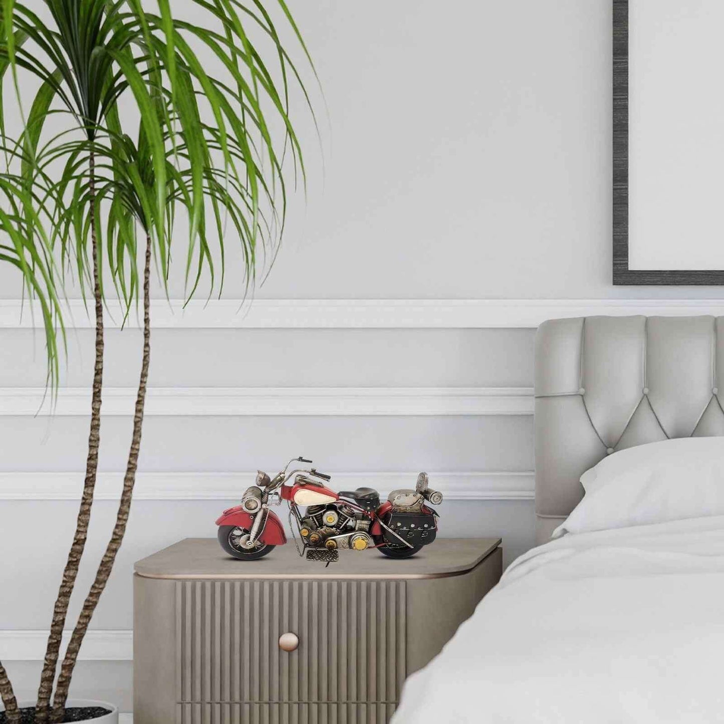 Decorative red motorcycle model displayed on a nightstand in a modern bedroom setting